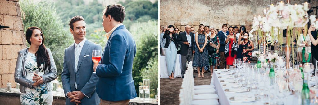 Fotografo Matrimonio Orvieto Gli invitati brindano e scattano fotografie alla tavola del ricevimento