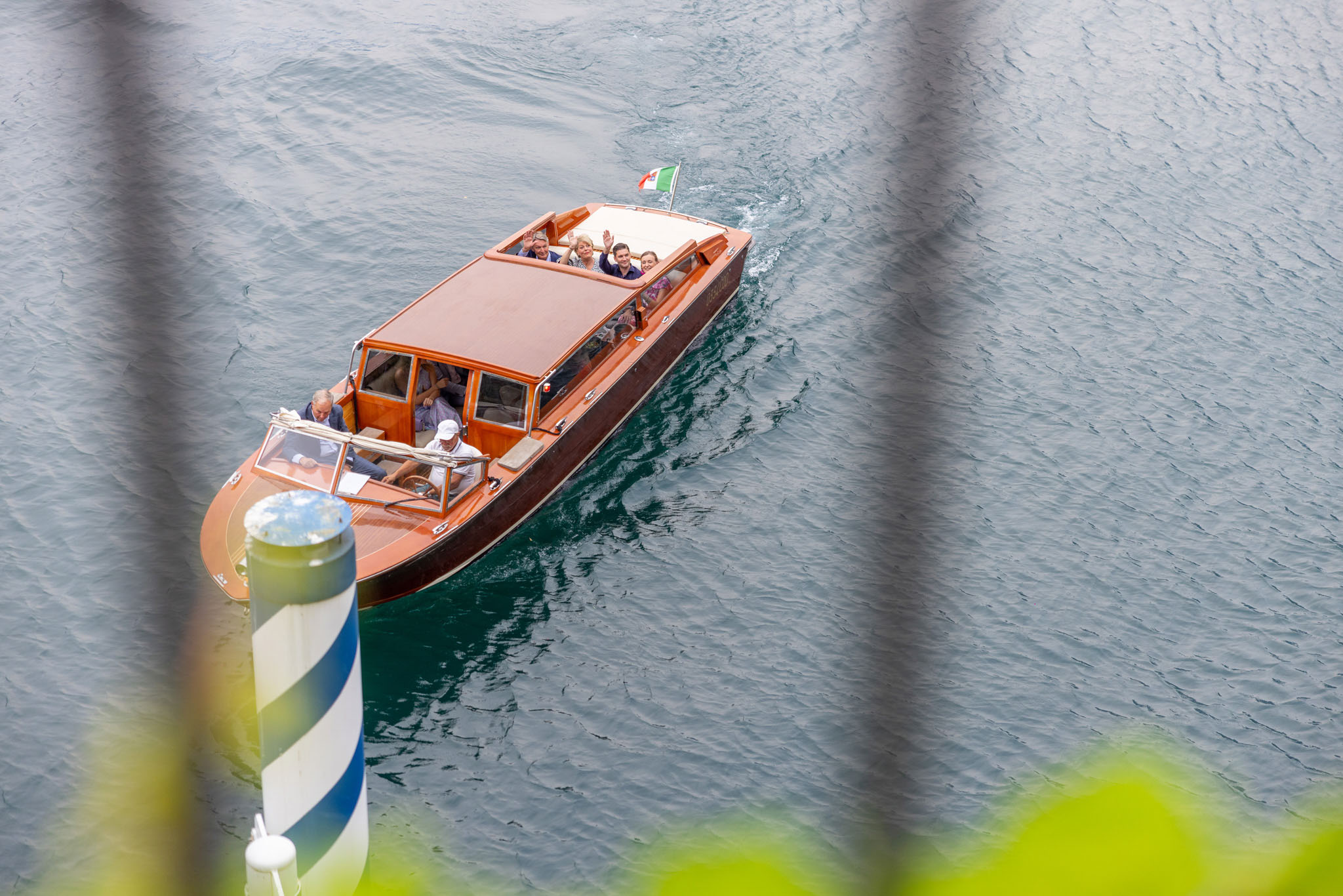 Destination Wedding Photographer Lake Como Nave sul lago di Como